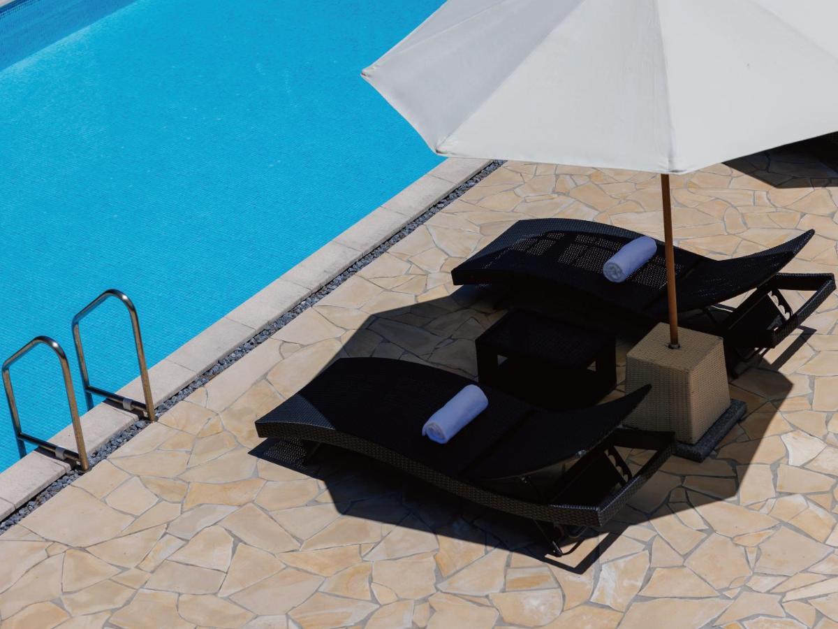 Homm Stay Yumiha Okinawa By Banyan Tree Group Onna Bagian luar foto